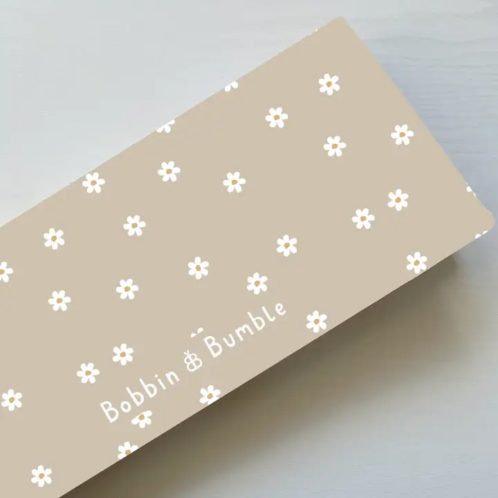 Neutral Daisy Travel Changing Mat